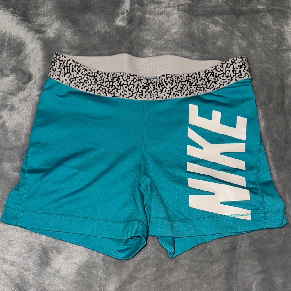 Nike Blue and White Athletic Shorts with Bold Branding